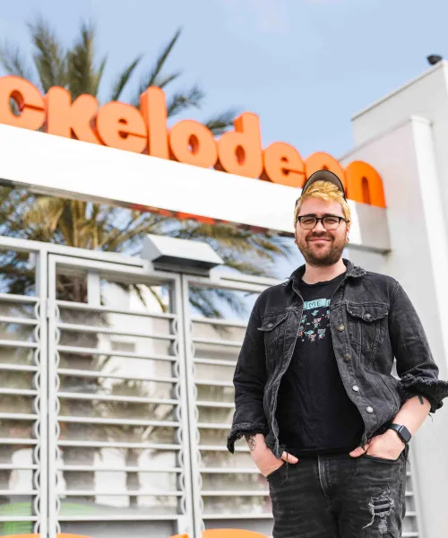 Josh Mckenzie standing in front of Nickelodeon Studios