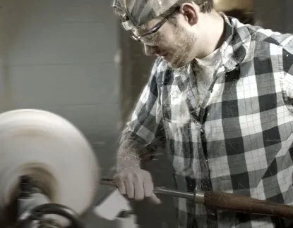 Art student at a polishing tool